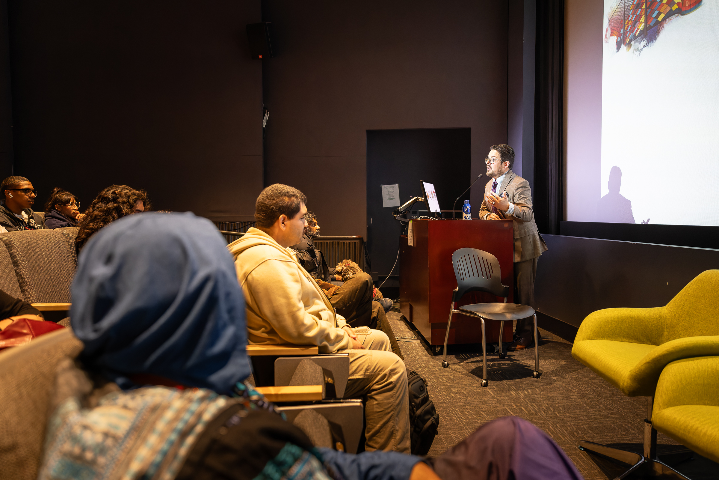 Dr. Zahzah talking to students.