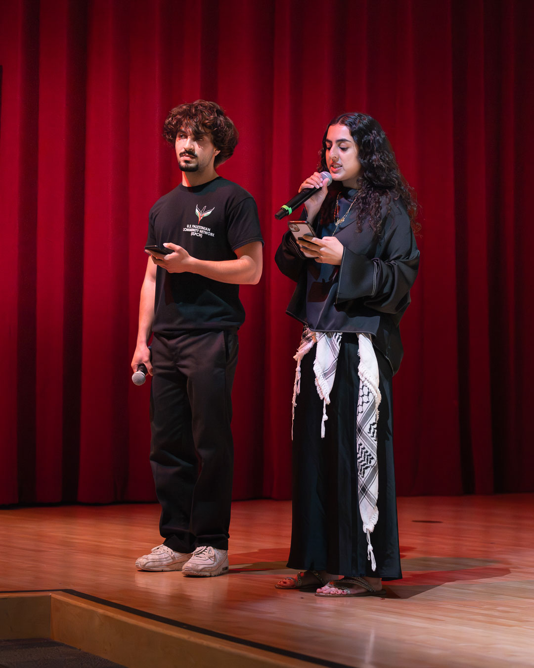 Two students introducing on stage