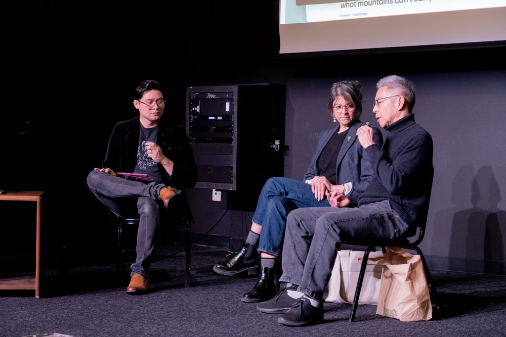 Medium shot of the people on stage