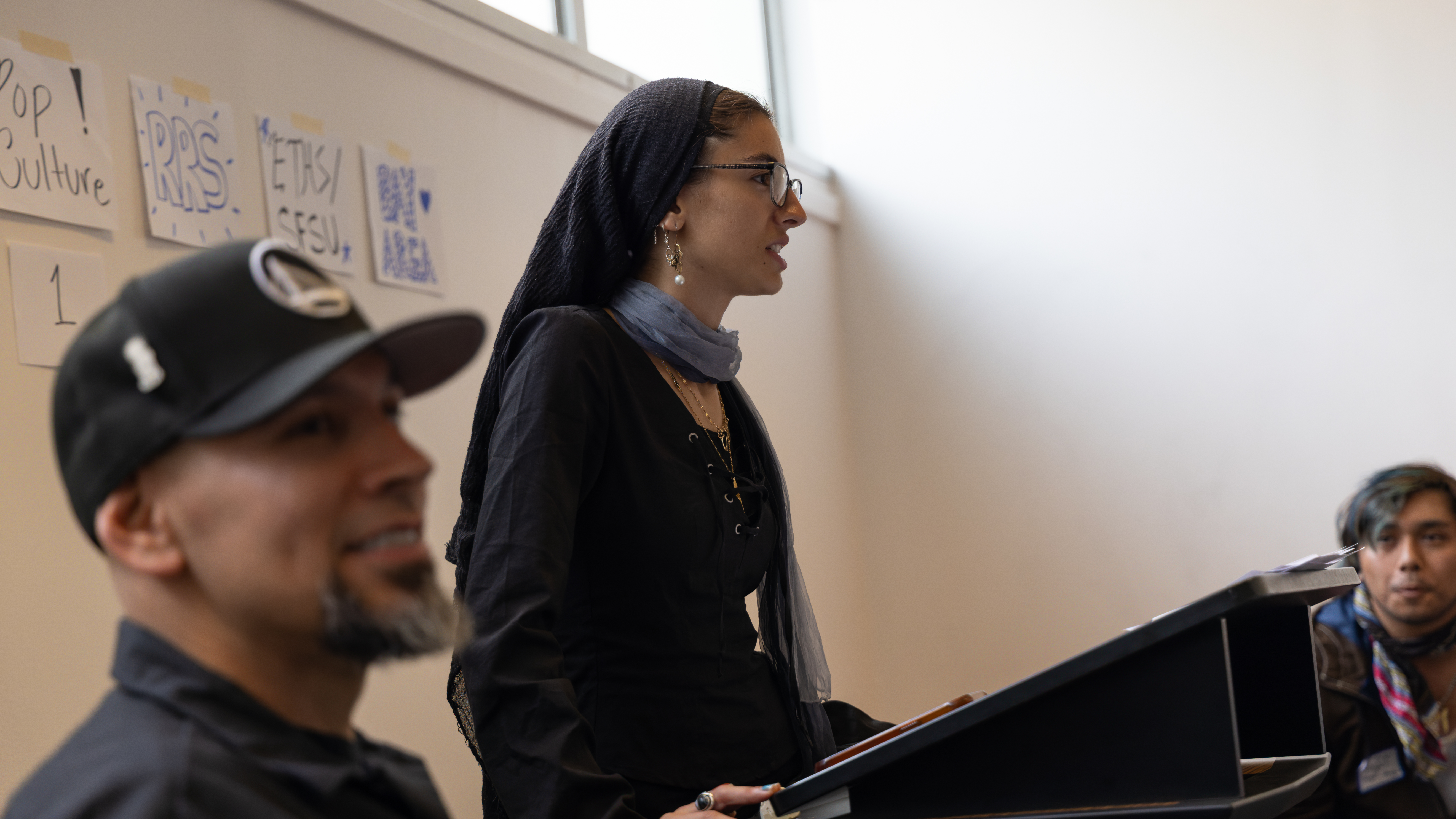 Trivia moderator at the podium.