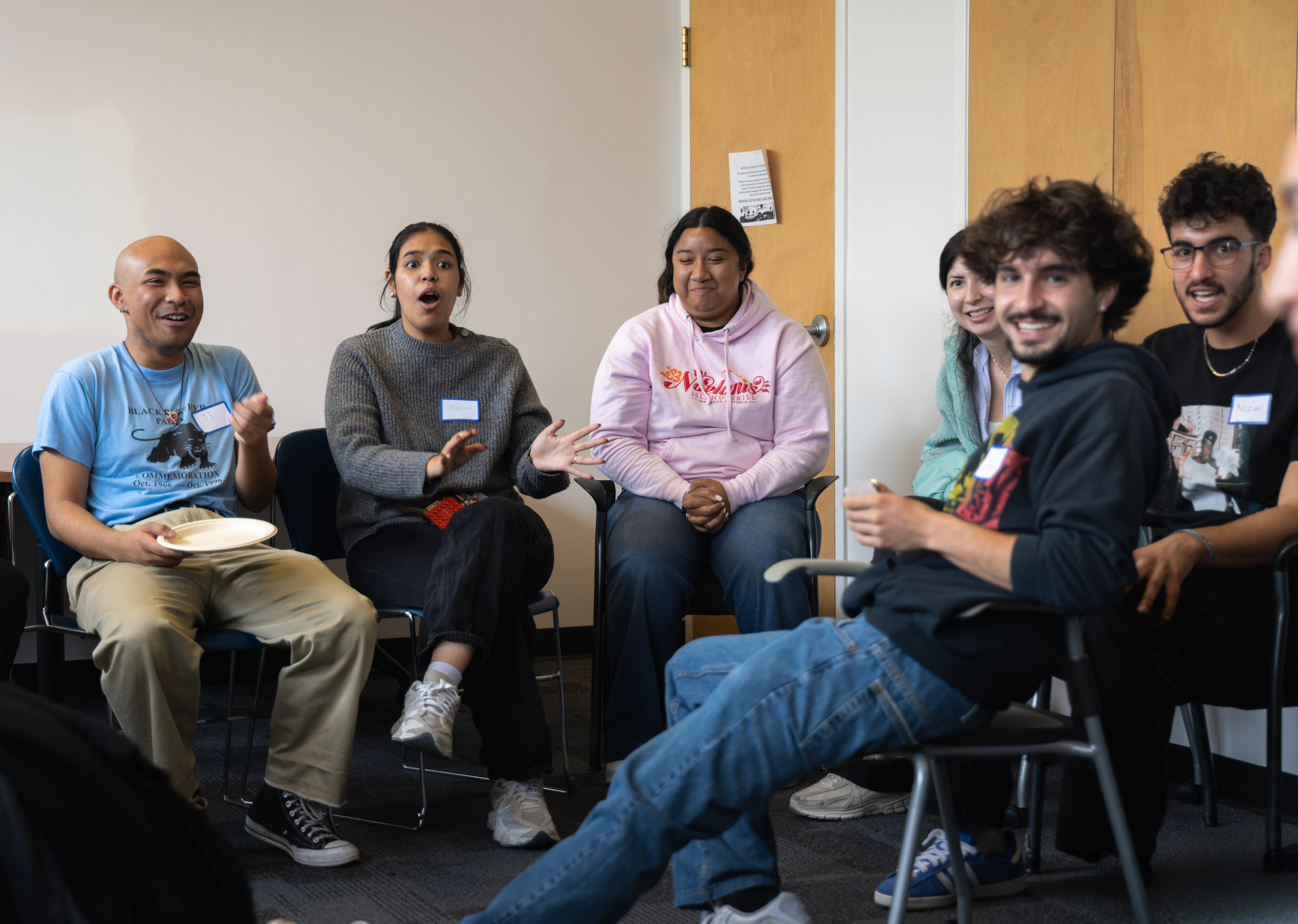 Students shocked at something (first photo of seqeunce)