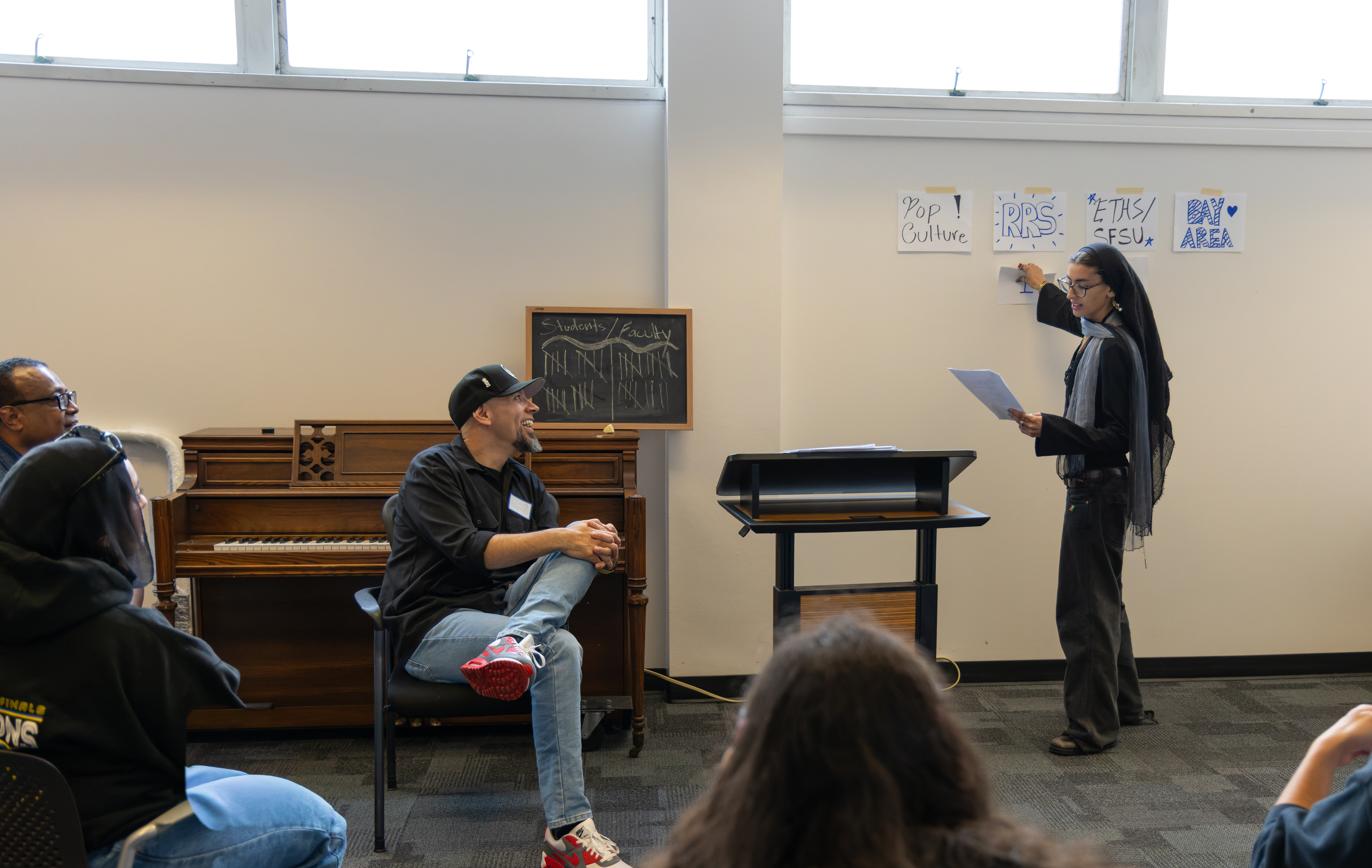 Trivia moderator picking the last category.